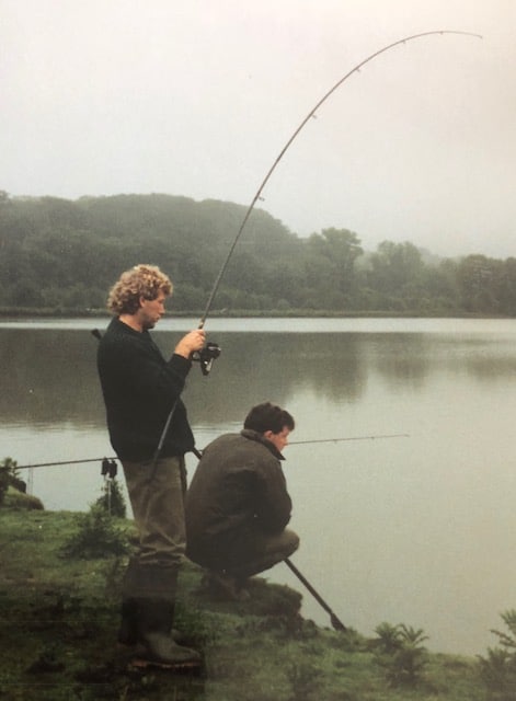 me and Terry carp angling, landing a carp early morning wondering what we’d hooked this time