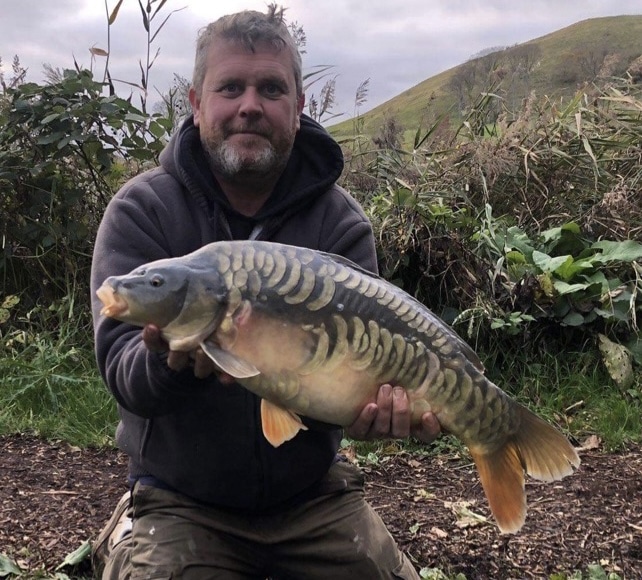Paul Wallis with one of the recently stocked mirror carp